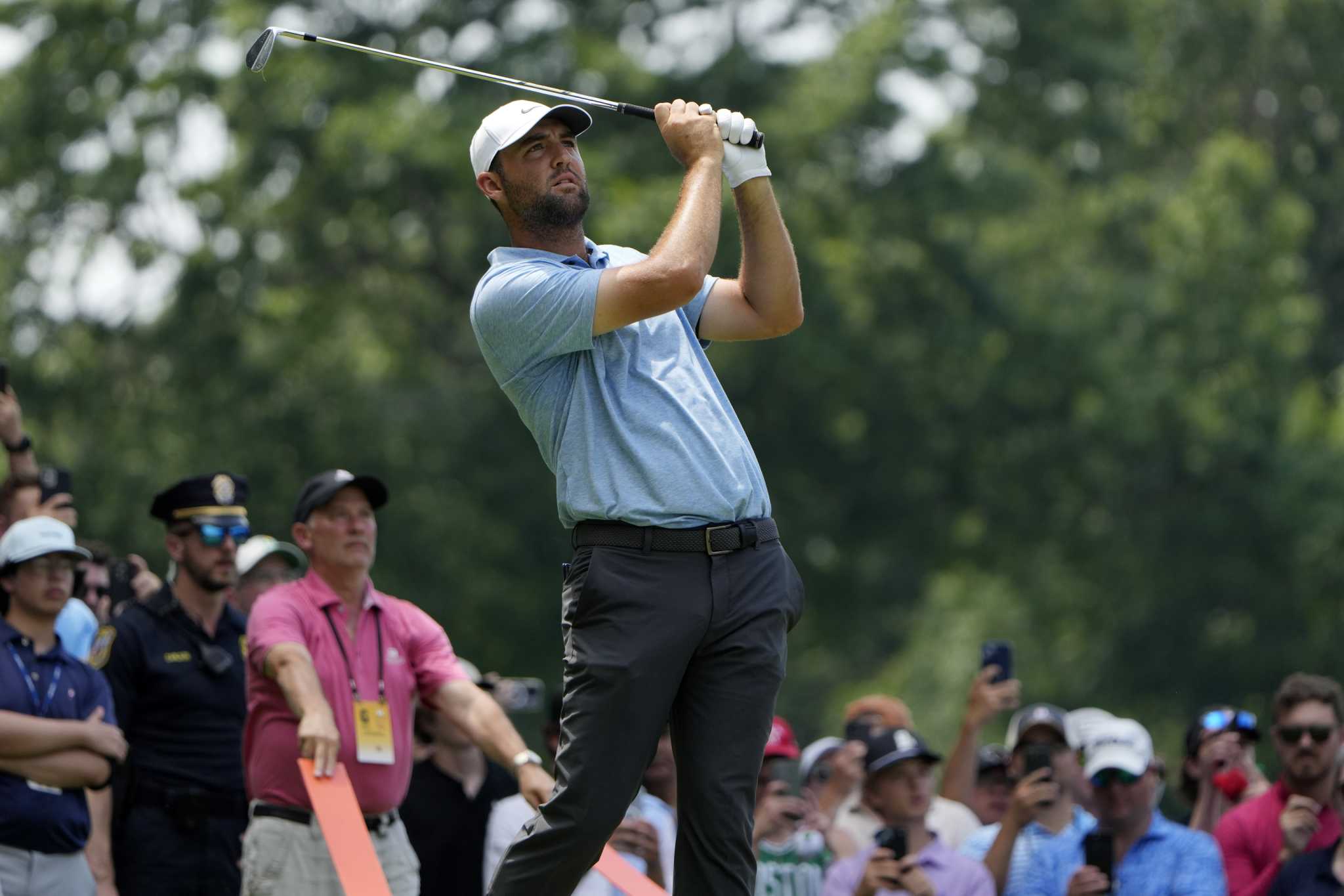 Scheffler outlasts protest on 18th green, Tom Kim to win Travelers for 6th victory of year