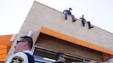 Franklin Park cops take to the Dunkin’ Donuts rooftop, raise $4K for Special Olympics Illinois