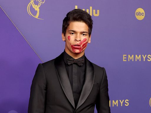 ‘Reservation Dogs’ Star D’Pharaoh Woon-A-Tai Brings Symbolic Message to Emmys With Red Hand Painted on Face