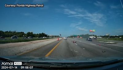 WATCH: SUV flips during crash on I-4 in Orange County, troopers searching for 3 people