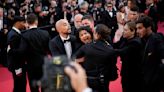 Protester crashes Cannes carpet at George Miller premiere