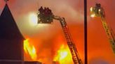 More than 170 firefighters tackling police station blaze