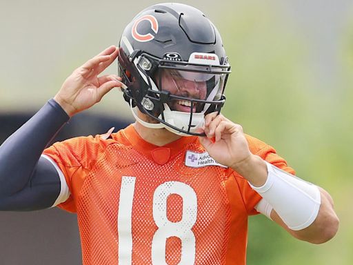 Bears' Caleb Williams signs rookie contract; franchise tag clause held up Chicago's deal with QB, per report