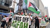 Pro-Palestine protestors march through downtown Detroit Monday