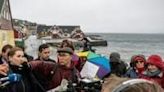 Demonstrators confronted Danish PM Mette Frederiksen (L) in Nuuk over the IUDs in June 2023