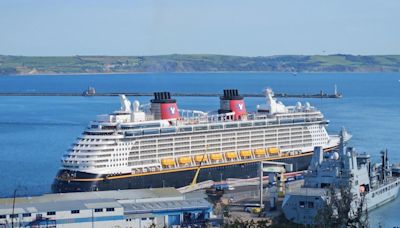 Huge Disney cruise ship docks at port