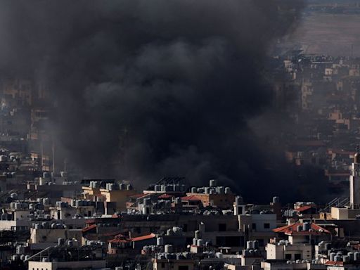 Israel strikes heart of Beirut, Iranian president is defiant