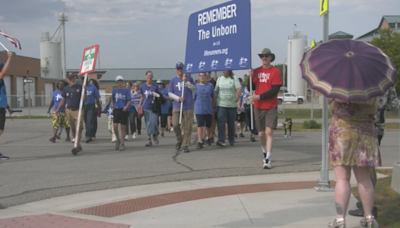 Abortion protestors walk from Fargo to Red River Women's Clinic as part of national rally - KVRR Local News