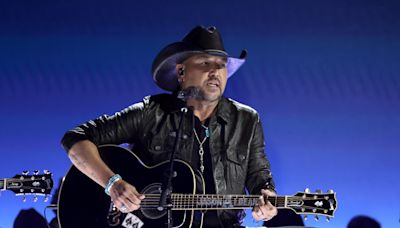 Jason Aldean kicks enthusiastic fan out of concert with police escort