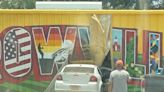 Car runs into the Crowville fire station, mural damaged 48 hours after it was finished