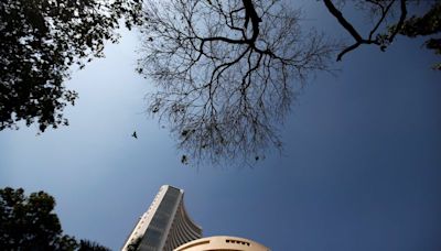 Indian shares close flat as profit-booking continues near record high levels