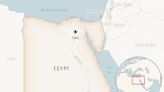 Vessel runs aground, briefly blocking Suez Canal