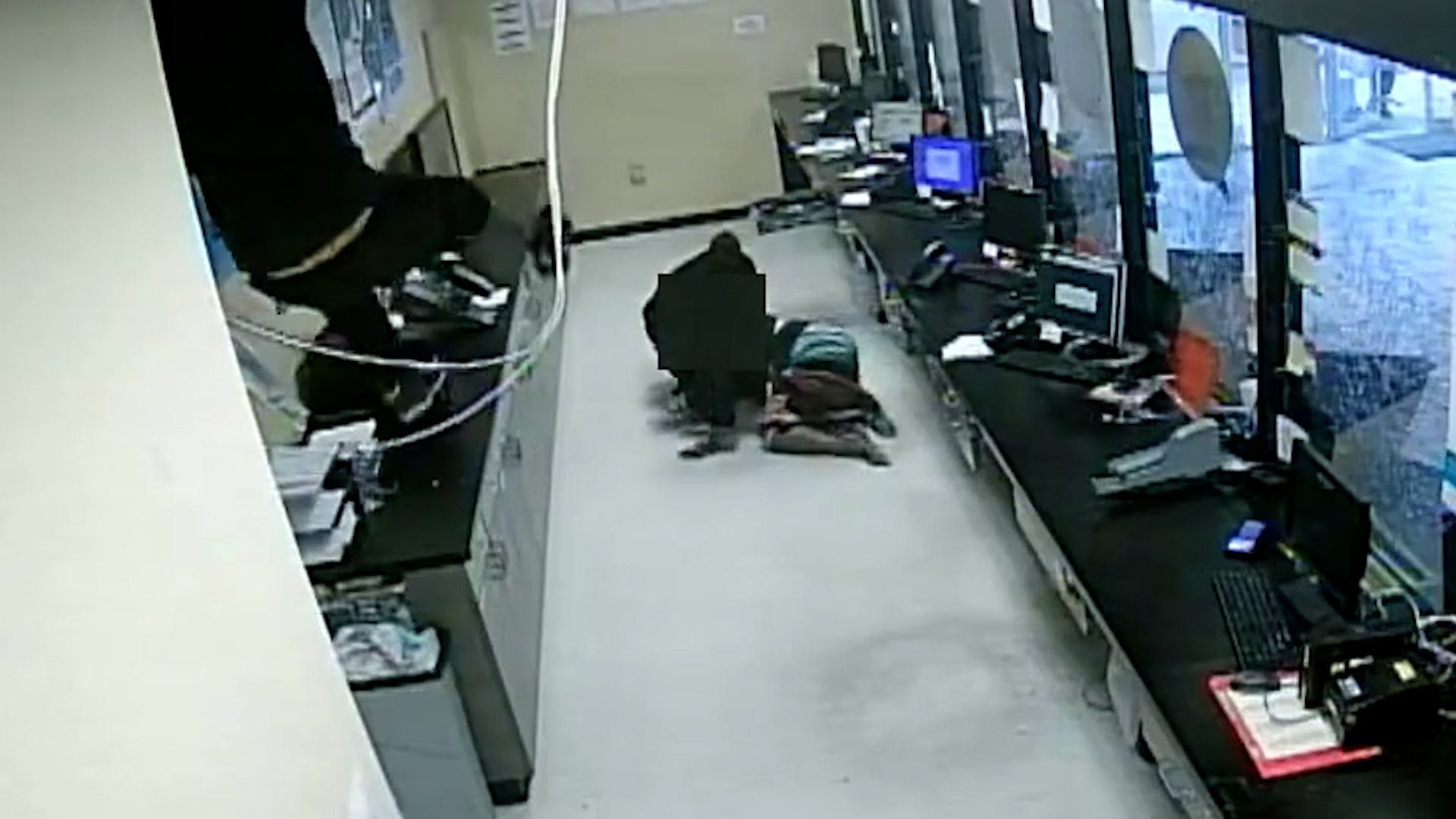 Video shows masked robbers plunging through ceiling to steal $150,000 from Atlanta business