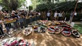 Volunteers reinforce gravediggers at main Israeli military cemetery