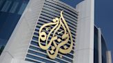 Israel bans, raids Al Jazeera as Hamas returns to Doha following ceasefire talks