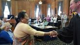 Utica welcomes 51 individuals as new American citizens at naturalization ceremony