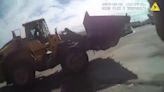 Watch police and front-end loader chase stolen tractor