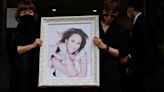 Singer CoCo Lee mourned by family and fans at emotional funeral