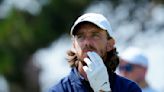 British Open: Tommy Fleetwood holds share of lead as big names struggle