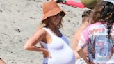 Heavily pregnant Ashley Tisdale shows off huge baby bump at beach