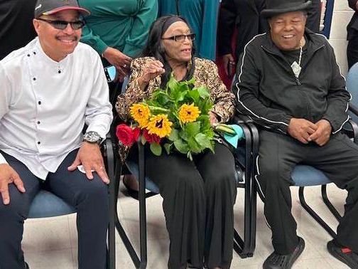 Michael Jackson's first music teacher reunites with family at school dedication