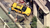 Taxi that jumped a curb, pinned two women against a wall had 18 traffic violations since 2019