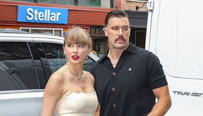 Taylor Swift attends New York wedding wearing cream floral dress with Travis Kelce