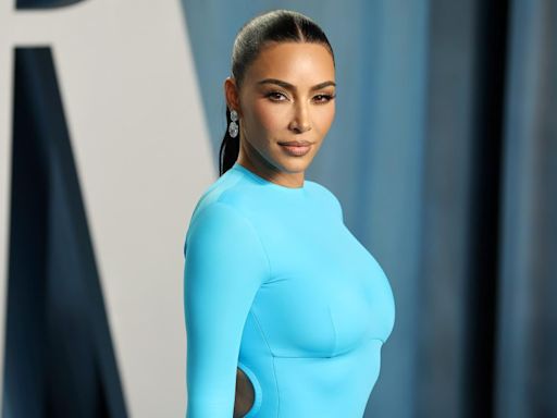 Chicago West Attempts to Wear Kim Kardashian’s Balenciaga Shoe Clutch