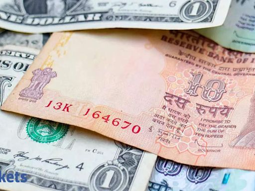 Rupee strengthens as dollar weakens, ends at 83.69 against USD - The Economic Times
