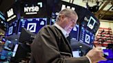 Wall St ends sharply lower as hot inflation sparks sell-off