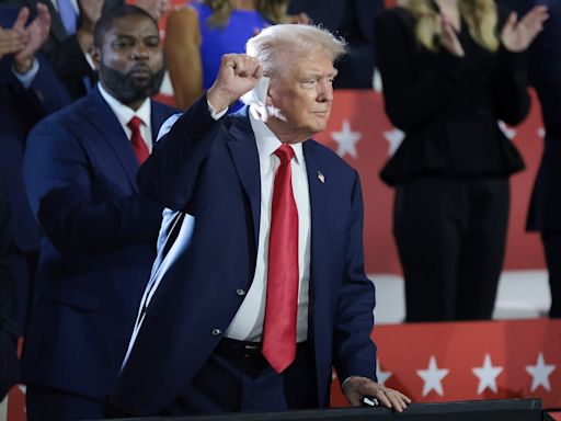 Trump makes dramatic appearance at RNC just days after being shot during assassination attempt