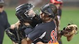 High school softball coaches can now communicate with catchers via electronic devices