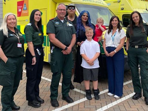 Woman reunited with paramedics who saved her life