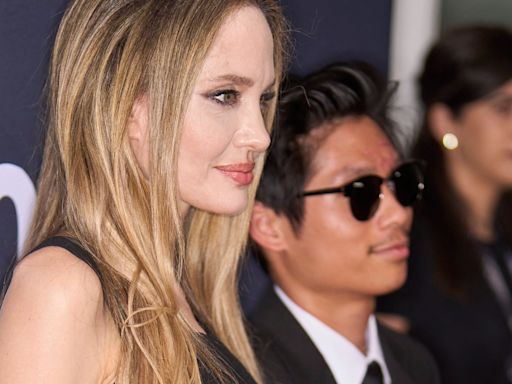 Angelina Jolie and Brad Pitt’s son Pax has facial scars in rare red carpet appearance