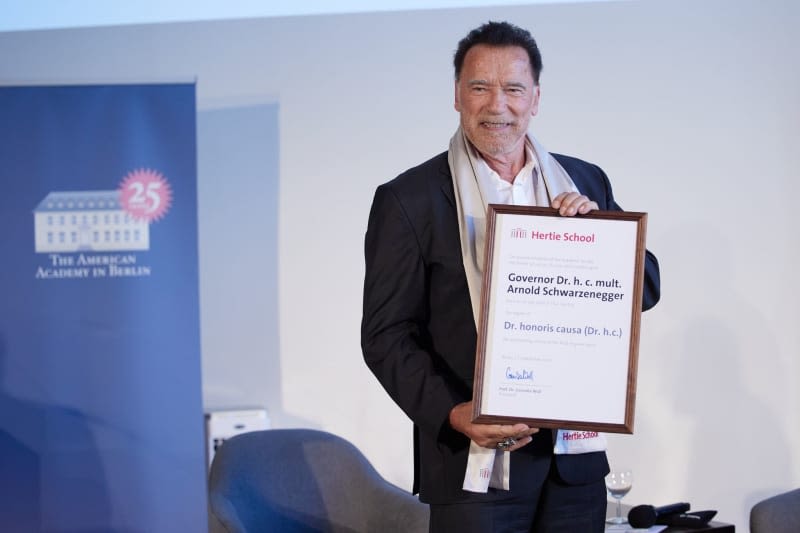 Dr Schwarzenegger: Action star honoured with doctorate in Berlin