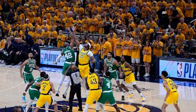 Jrue Holiday's finishing flurry helps Celtics beat Pacers 114-111 for 3-0 lead in East finals