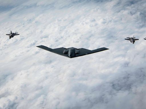 Photos show a US Air Force B-2 Spirit bomber flying with Japanese F-35s for the first time