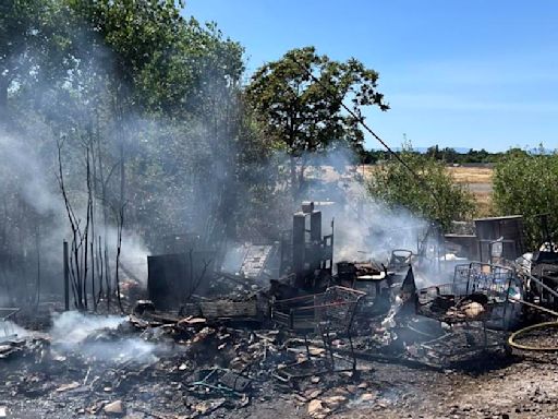 Firefighters responding to vegetation fire near Chase bank in Red Bluff