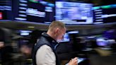 Wall Street ends sharply lower as anxiety rises, earnings heat up