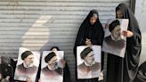 Iran's supreme leader leads prayers at Raisi funeral