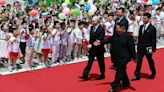 Putin signs partnership pact with Kim as Pyongyang welcomes Russian leader with fanfare