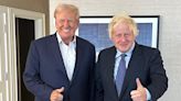 Boris Johnson poses alongside bandaged Donald Trump