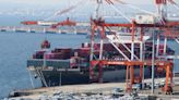 Japan records a trade deficit for the third straight fiscal year despite recovering exports