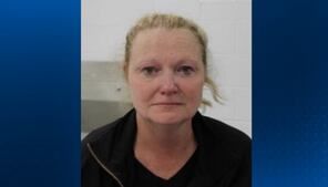 Fayette County woman charged with chaining intellectually disabled adopted daughter to bed