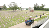 Volunteers help place 8,000 flags for annual Symbols of Sacrifice