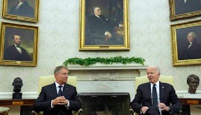 Biden hosts Romanian leader at the White House to celebrate NATO partnership