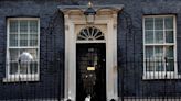 Who else lives in Downing Street apart from the prime minister?