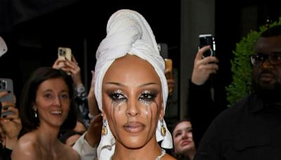 Doja Cat Stuns in See-Through Wet T-Shirt Dress at 2024 Met Gala - E! Online