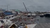 Damaged fishing boats sinking in port after Hurricane Beryl lashes Barbados