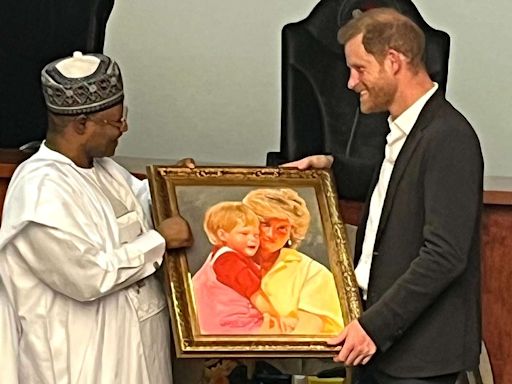 Prince Harry Gifted Special Paintings Honoring Princess Diana and His Wedding Day on Solo Outing in Nigeria